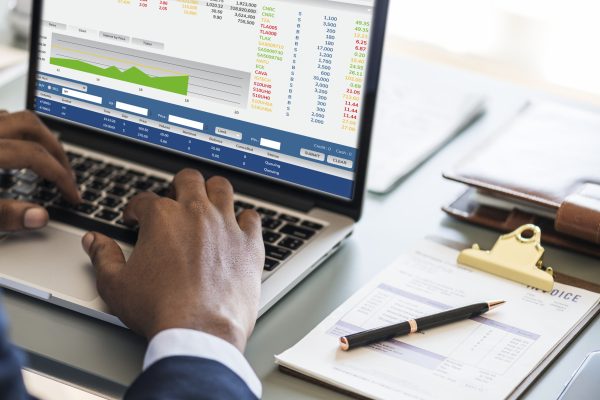 Black businessman using computer laptop